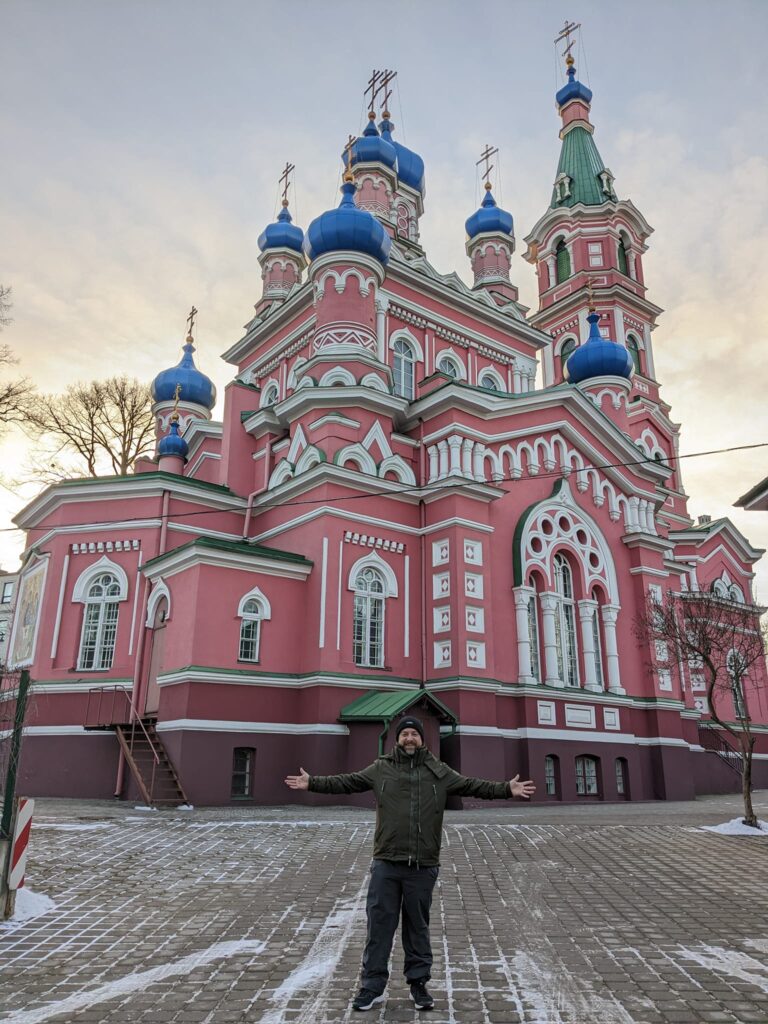 Kevin outside the Cathedral Riga City Break - 10 Best Things to do in Latvia's Beautiful Capital Happy Irish Wanderers