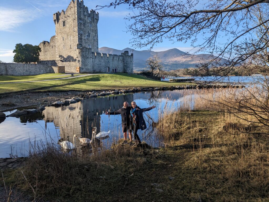 happy irish wanderers ross castle kilarney ireland