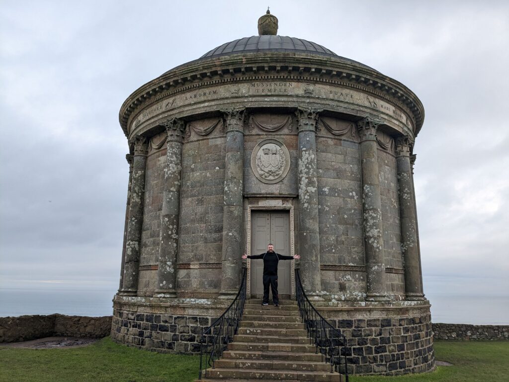 Kevin outside Mussenden Temple coastal views Famous Ireland Landmarks: 101 of The Greatest Attractions - 81-101