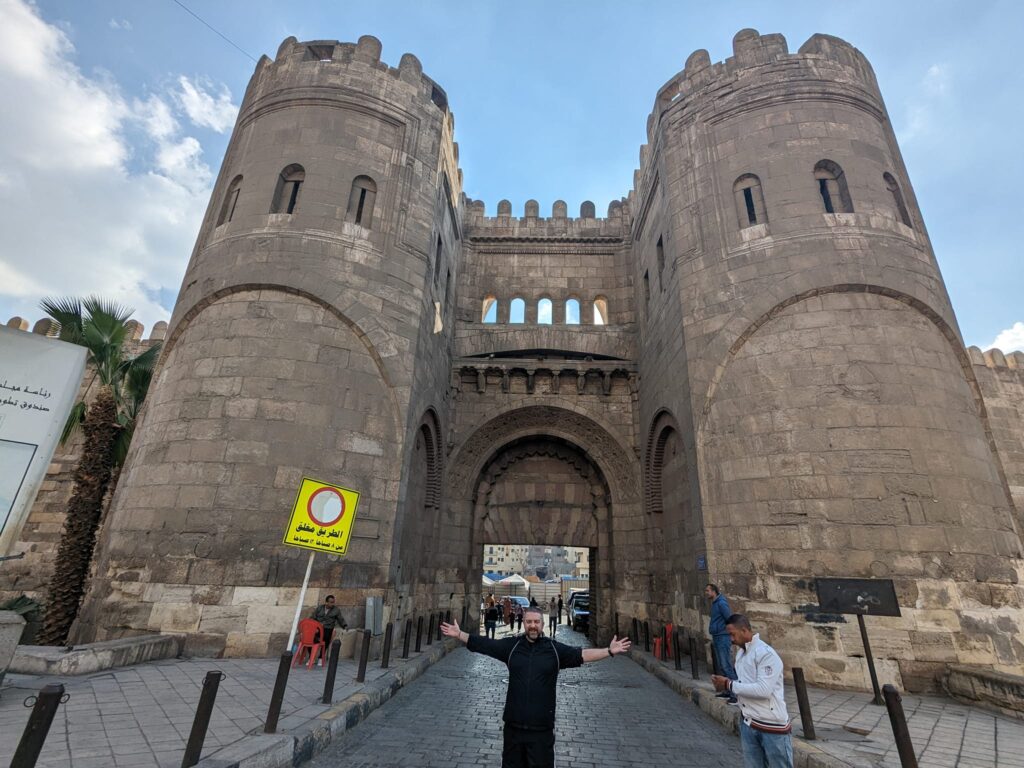 kevin outside Bab al Futuh Happy Irish Wanderers Cairo Egypt