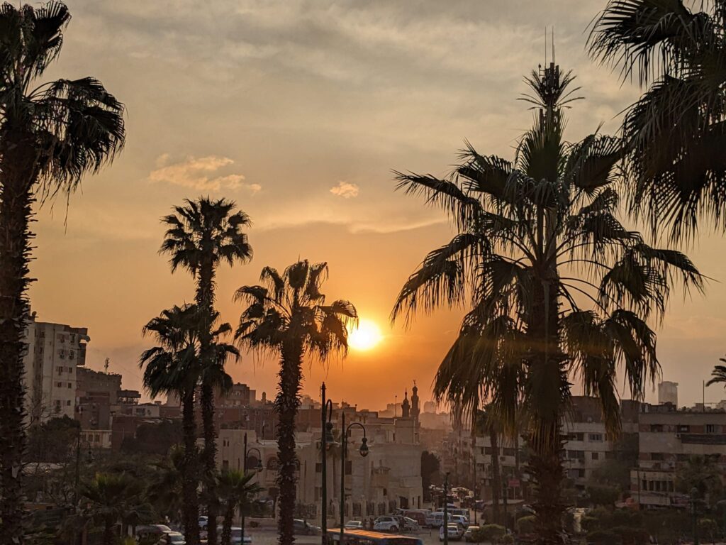 Sunset in Cairo Truly Discover Cairo: 15 Unique Cairo Attractions to Visit Now Happy Irish Wanderers