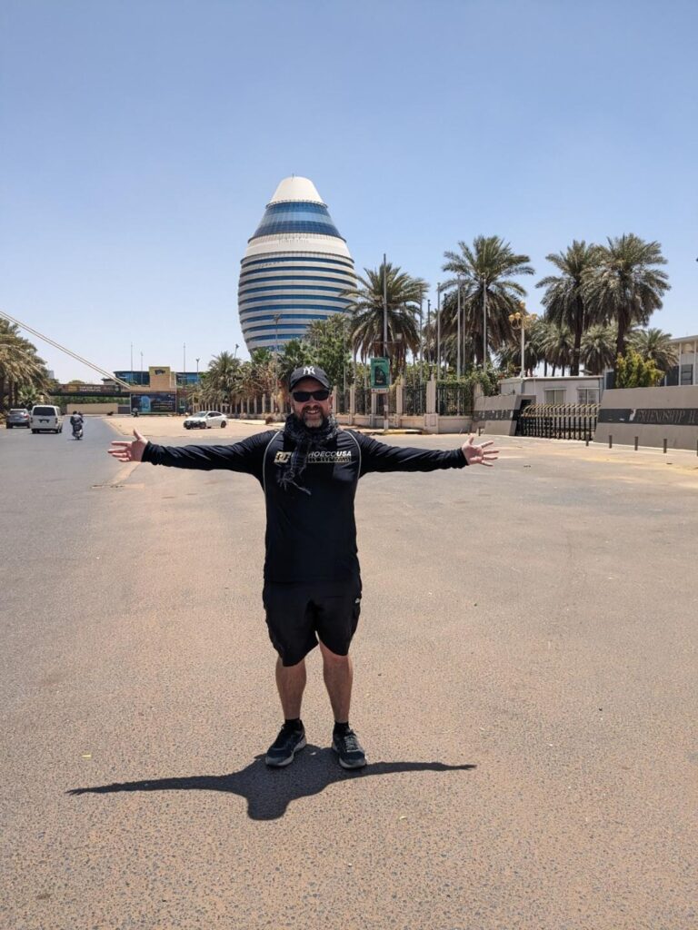 Kevin with the  "Gaddafi Egg" in Khartoum, Sudan - Happy Irish Wanderers