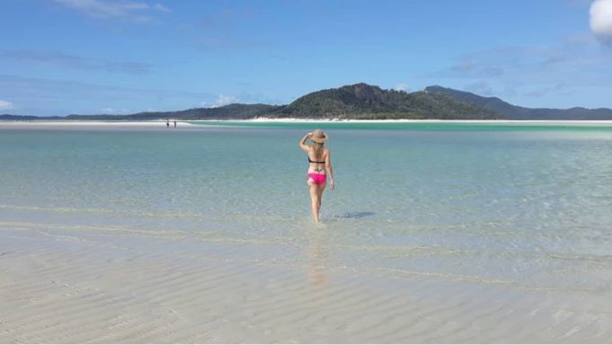 Kate at the Whitehaven beach. Is Airlie Beach Worth Visiting? Everything You Need to Know Happy Irish Wanderers