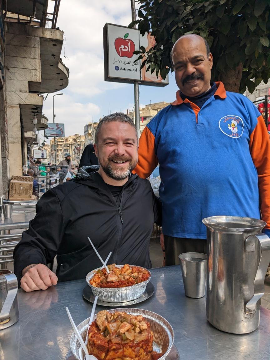 Kevin in a local restaurant in Egypt How to Eat Cheap Around The World - 10 Easy Tips Happy Irish Wanderers