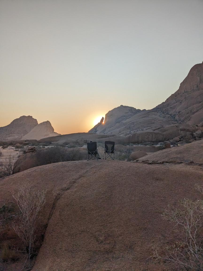 Kate from happy irish Wanderers watching sunset in Namibia