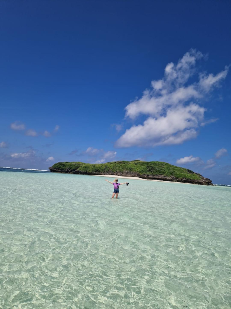 Kate in the clear waters of Watamu Beach 10 Best And Most Popular To Visit Kenya Attractions - Happy Irish Wanderers