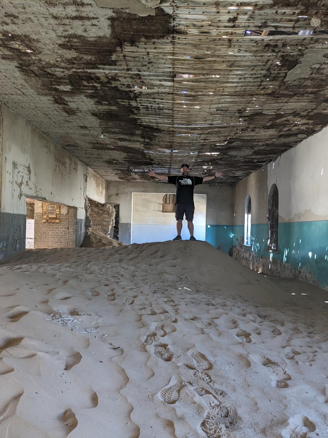 Kolmanskop ghost town in Namibia, Inside one of many abandoned buildings - Happy Irish Wanderers