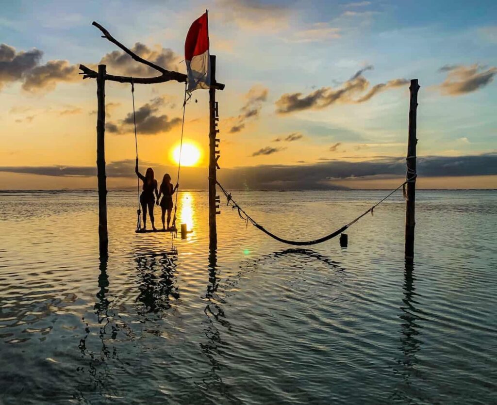 Gili Island swing at sunset Which Gili Island is best for you? 