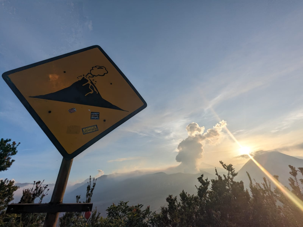 Volcano signpost and Mount Bromo - How to Hike Mount Bromo for FREE - Indonesia's Most Incredible Volcano Happy Irish Wanderers