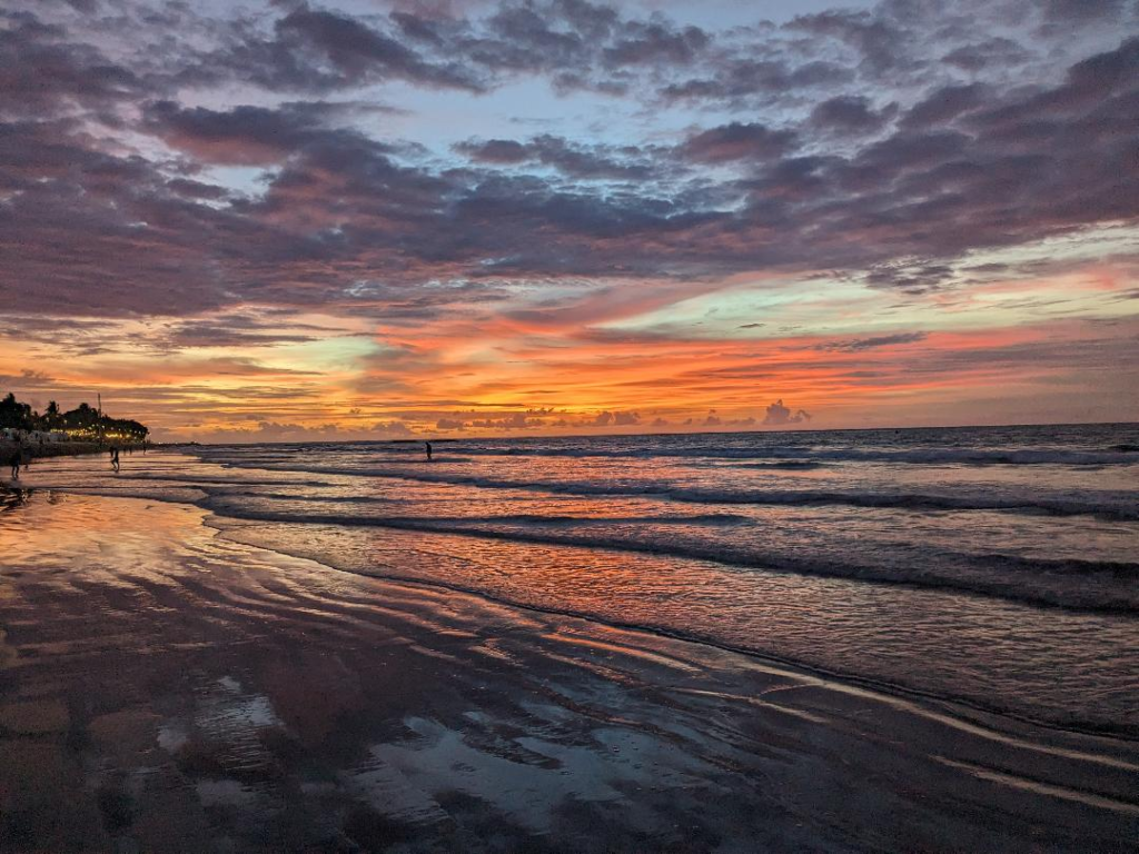 Kuta Beach at sunset in Beautiful Bali - 12 of the Best Bali Attractions to Visit Happy Irish Wanderers