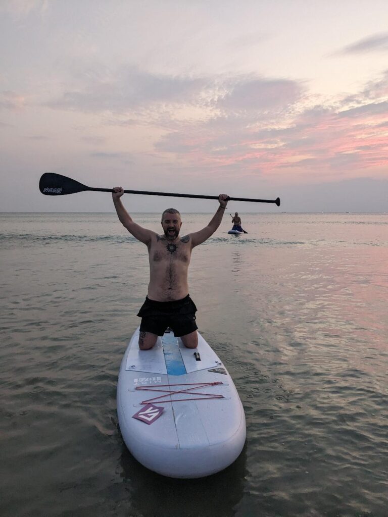 Kevin given Paddle boarding a go at sunset in Koh Lanta Happy Irish Wanderers