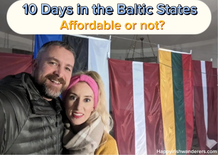 Kate and Kevin with all the Baltic States flags - The Best 10-Day Baltic States Itinerary Happy Irish Wanderers