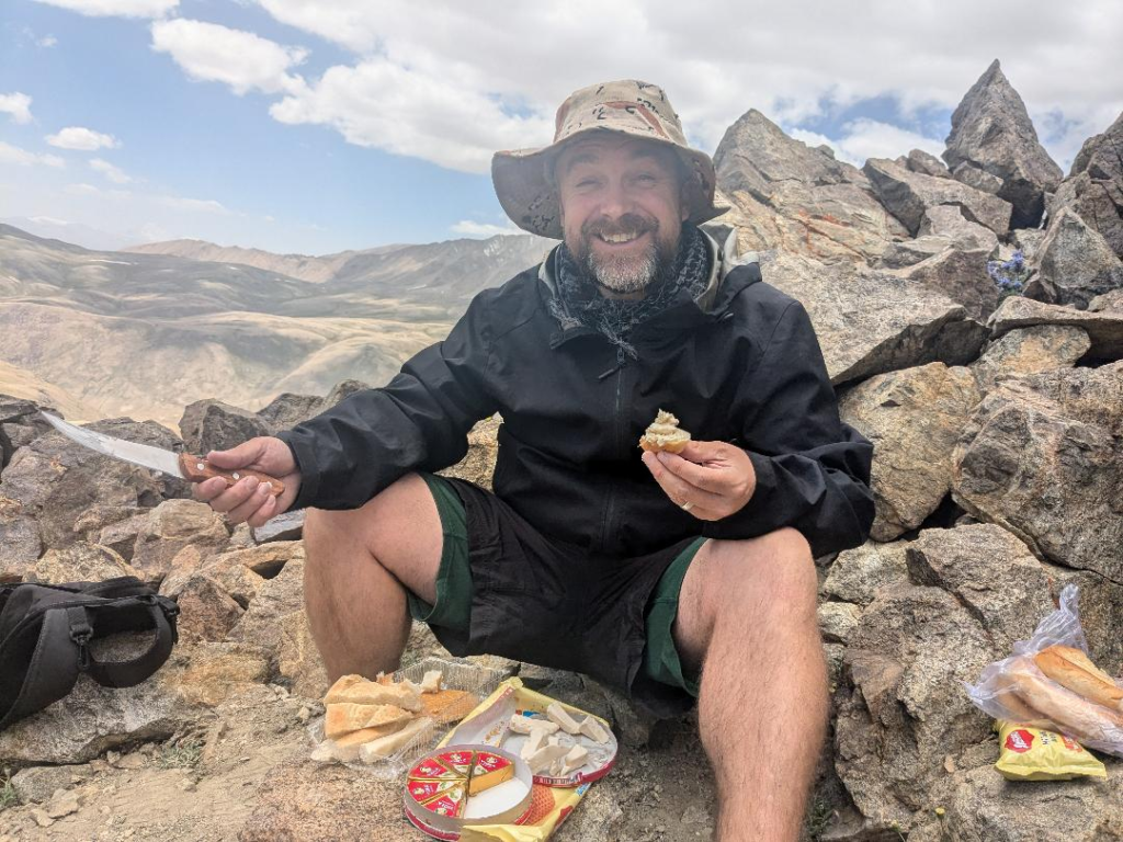 Tajikistan Holiday Kevin eating our own food Happy Irish Wanderers